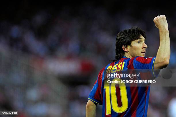 File picture dated May 8, 2010 shows Barcelona's Argentinian forward Lionel Messi celebrating after scoring against Sevilla during a Spanish league...