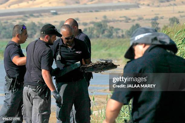 Israeli forces search the Sea of Galilee coasts for the remains of a reported drone launched from Syria and intercepted by a Patriot missile on July...