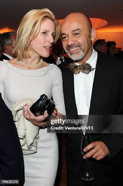 Shoe designer Christian Louboutin and guest attends the Vanity Fair and Gucci Party Honoring Martin Scorsese during the 63rd Annual Cannes Film...