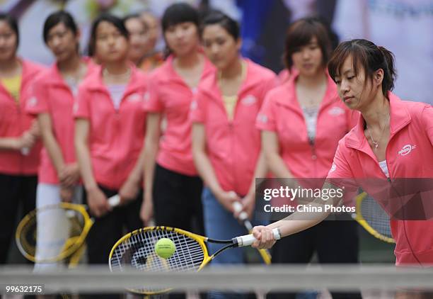 Students take part in the training session of Kappa Tennis Cheering Show on May 16, 2010 in Beijing, China. Kappa Tennis Cheering Show is an event...