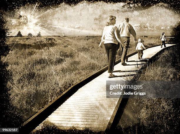 family walking along a path - transfer print stock pictures, royalty-free photos & images