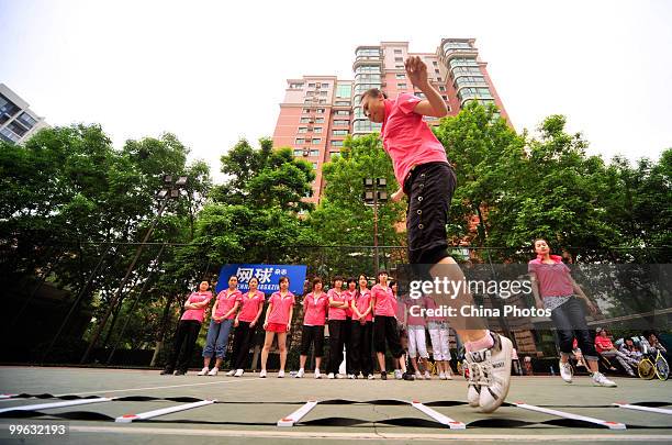Students take part in the training session of Kappa Tennis Cheering Show on May 16, 2010 in Beijing, China. Kappa Tennis Cheering Show is an event...