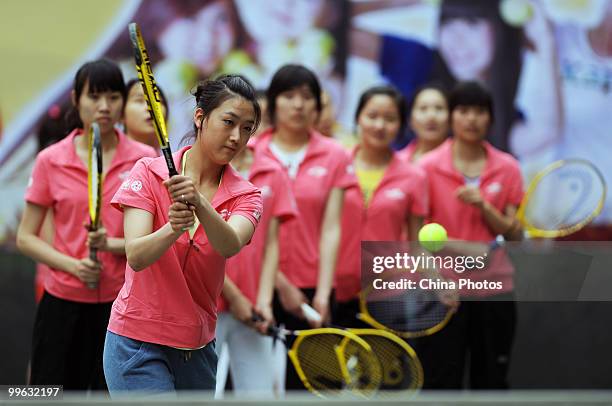 Students take part in the training session of Kappa Tennis Cheering Show on May 16, 2010 in Beijing, China. Kappa Tennis Cheering Show is an event...