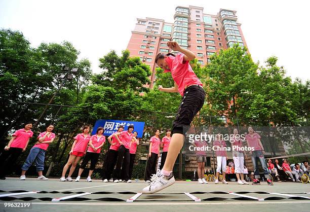 Students take part in the training session of Kappa Tennis Cheering Show on May 16, 2010 in Beijing, China. Kappa Tennis Cheering Show is an event...