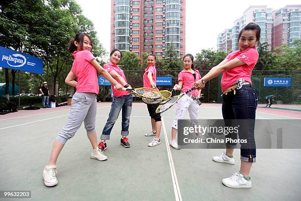 Students pose during the training session of Kappa Tennis Cheering Show on May 16, 2010 in Beijing, China. Kappa Tennis Cheering Show is an event...