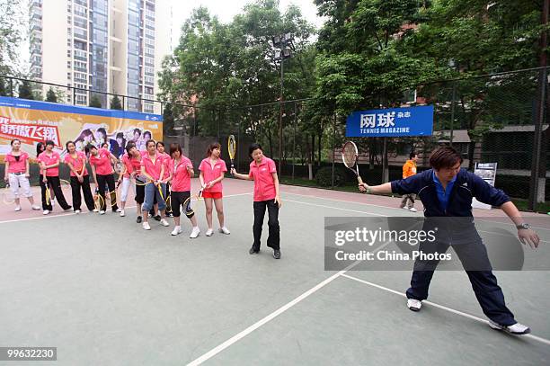 Students take part in the training session of Kappa Tennis Cheering Show on May 16, 2010 in Beijing, China. Kappa Tennis Cheering Show is an event...