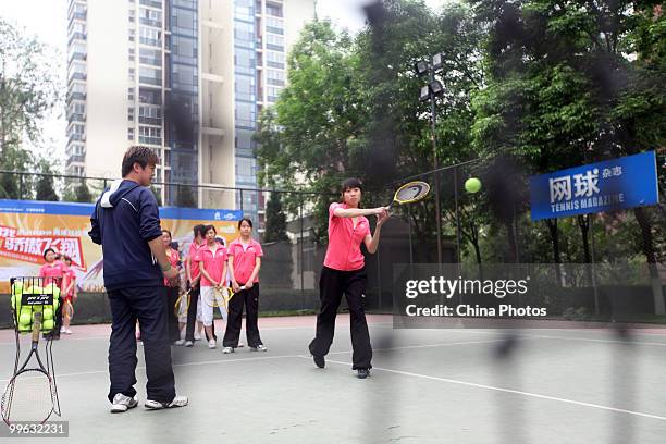 Students take part in the training session of Kappa Tennis Cheering Show on May 16, 2010 in Beijing, China. Kappa Tennis Cheering Show is an event...