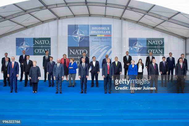 Heads of state and government, including Lithuanian President Dalia Grybauskaite , French President Emmanuel Macron , Belgian Prime Minister Charles...