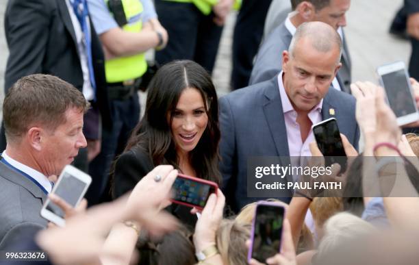 Britain's Meghan, Duchess of Sussex greets well-wishers on a walk about in Dublin city centre on the final day of a two day visit in Dublin, Ireland...