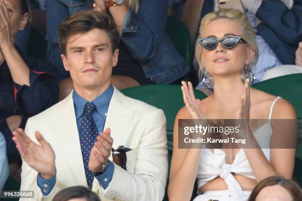 Oliver Cheshire and Pixie Lott attend day nine of the Wimbledon Tennis Championships at the All England Lawn Tennis and Croquet Club on July 11, 2018...