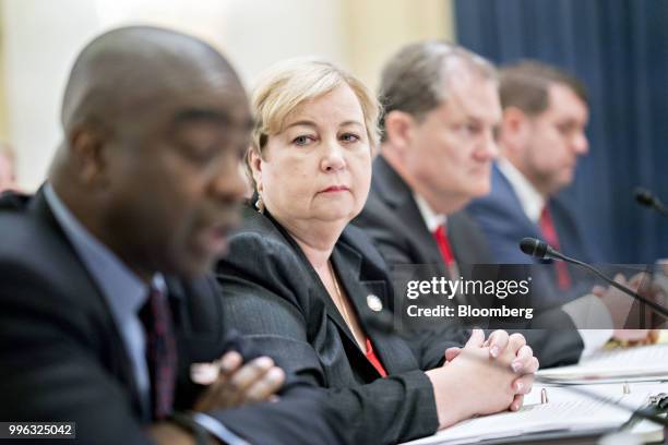 Christy McCormick, vice chair of the U.S. Election Assistance Commission , second left, listens during a Senate Rules and Administration Committee...