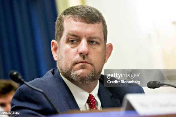 Matt Masterson, senior cybersecurity advisor with the Department of Homeland Security , listens during a Senate Rules and Administration Committee...