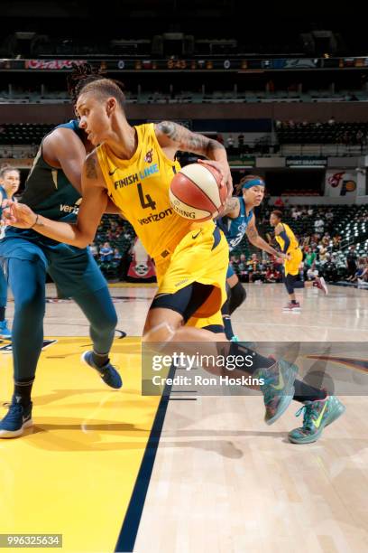 Candice Dupree of the Indiana Fever handles the ball against the Minnesota Lynx on July 11, 2018 at Bankers Life Fieldhouse in Indianapolis, Indiana....