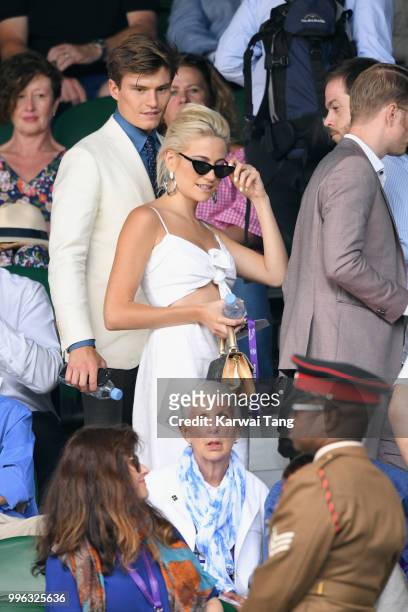 Oliver Cheshire and Pixie Lott attend day nine of the Wimbledon Tennis Championships at the All England Lawn Tennis and Croquet Club on July 11, 2018...