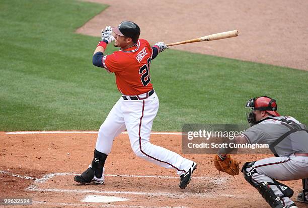 Eric Hinske of the Atlanta Braves hits a 5th inning home run against the Arizona Diamondbacks at Turner Field on May 16 2010 in Atlanta, Georgia. The...