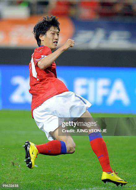 South Korea's Lee Choung-Yong celebrates after scoring against Ecuador during a friendly football match in Seoul on May 16, 2010 ahead of their...
