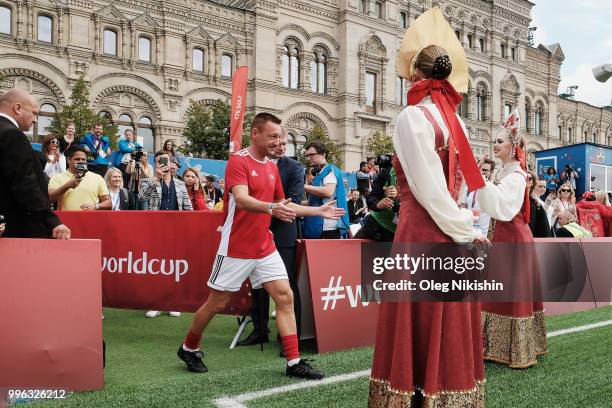 Andrey Tikhonov is being greeted during the Legends Football Match in "The park of Soccer and rest" at Red Square on July 11, 2018 in Moscow, Russia.