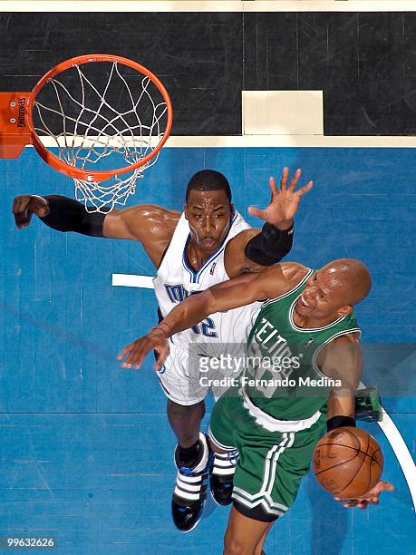 Ray Allen of the Boston Celtics takes the ball to the basket against Dwight Howard of the Orlando Magic in Game One of the Eastern Conference Finals...