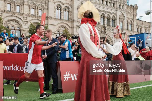 Lothar Matthaus is being greeted during the Legends Football Match in "The park of Soccer and rest" at Red Square on July 11, 2018 in Moscow, Russia.