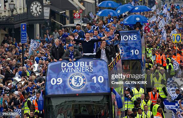 Chelsea's Captain John Terry celebrates with teammates after winning the Barclays Premiership Trophy and FA Cup during their victory parade at...
