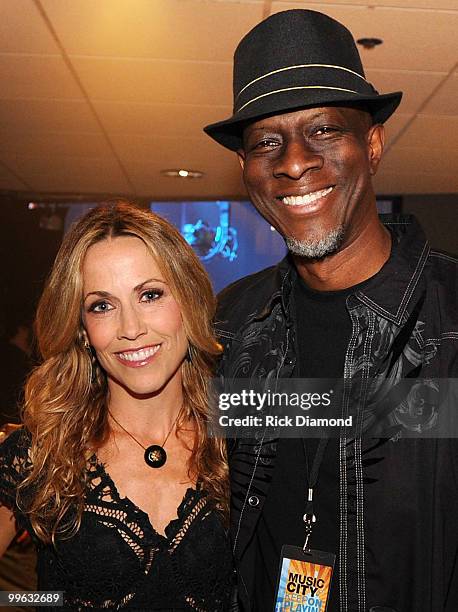 Singers/Songwriters Sheryl Crow and Keb Mo backstage during the "Music City Keep on Playin'" benefit concert at the Ryman Auditorium on May 16, 2010...