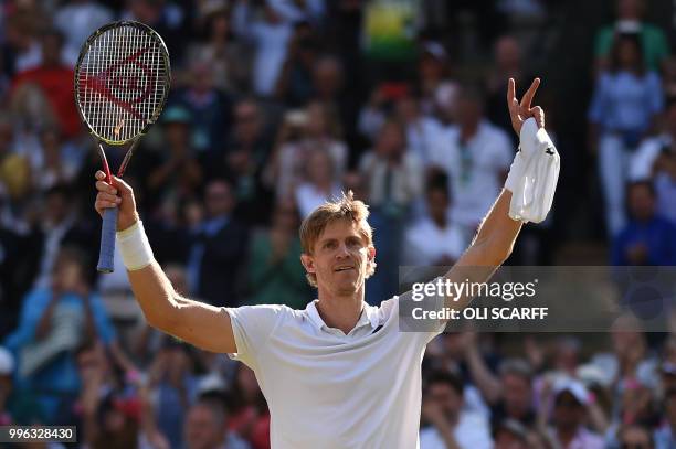 South Africa's Kevin Anderson celebrates after winning against Switzerland's Roger Federer during their men's singles quarter-finals match on the...