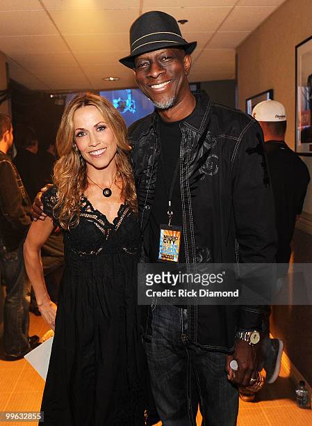 Singers/Songwriters Sheryl Crow and Keb Mo backstage during the "Music City Keep on Playin'" benefit concert at the Ryman Auditorium on May 16, 2010...