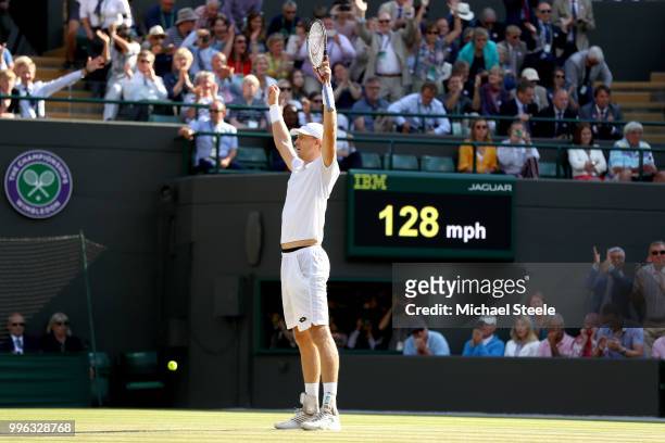 Kevin Anderson of South Africa celebrates winning match point against Roger Federer of Switzerland during their Men's Singles Quarter-Finals match on...
