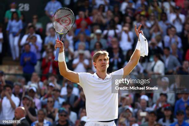 Kevin Anderson of South Africa celebrates winning match point against Roger Federer of Switzerland during their Men's Singles Quarter-Finals match on...