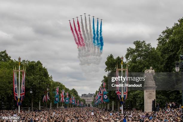 In this handout image provided by the Ministry of Defence, the Red Arrows perform for the RAF100 flypast over London during RAF 100 celebrations on...