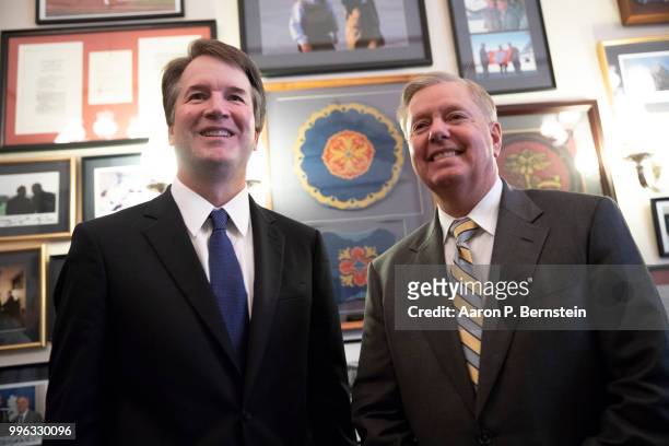 July 11: Judge Brett Kavanaugh meets with Senator Lindsey Graham July 11, 2018 on Capitol Hill in Washington, DC. Judge Kavanaugh, currently of the...