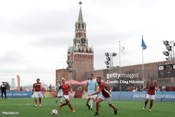 Marina Fedorova, Juan Pablo Angel and Andrey Tikhonov in action during the Legends Football Match in "The park of Soccer and rest" at Red Square on...