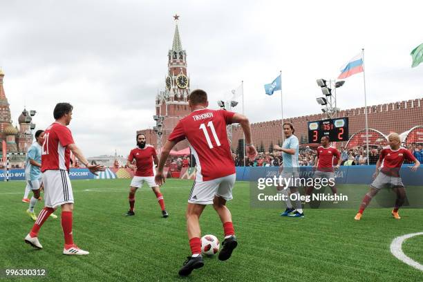 Andrey Tikhonov and Alexey Smertin in action during the Legends Football Match in "The park of Soccer and rest" at Red Square on July 11, 2018 in...