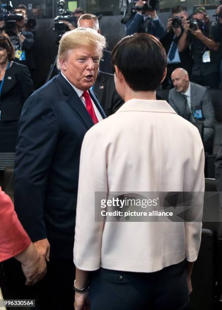 July 2018, Brussels, Belgium: Donald Trump, President of the United States of America, greets Ine Marie Eriksen Soreide, Norway's Minister of Foreign...