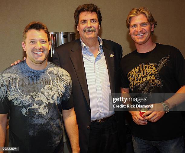 Driver car Tont Stewart, NASCAR President Mike Helton and NASCAR Driver car Cale Gale backstage during the "Music City Keep on Playin'" benefit...