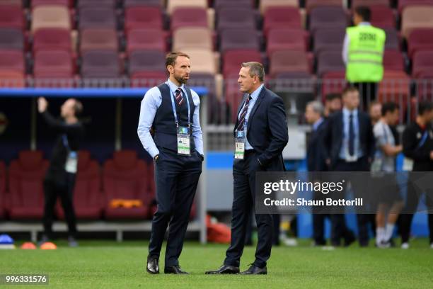 Gareth Southgate , Manager of England and Aidy Boothroyd inspect the pitch prior to the 2018 FIFA World Cup Russia Semi Final match between England...