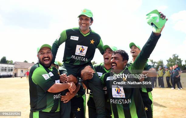 Sher Ali Afridi and the Pakistan players celebrate after winning the Vitality IT20 Physical Disability Tri-Series match between England and Pakistan...