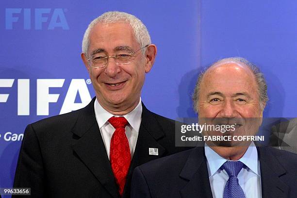 England 2018 World Cup bid chairman Lord Triesman stands beside FIFA president Sepp Blatter during the official handover of the England 2018 World...