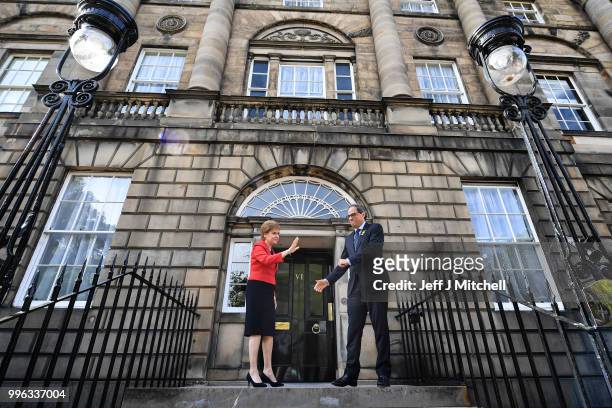 Scotland's First Minister Nicola Sturgeon shakes hands with President of Catalonia Quim Torra, following a meeting at Bute House on July 11, 2018 in...