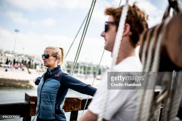 In this handout image provided by Red Bull, Rhiannan Iffland of Australia warms up alongside Andy Jones of the USA onboard the caravel Vera Cruz...