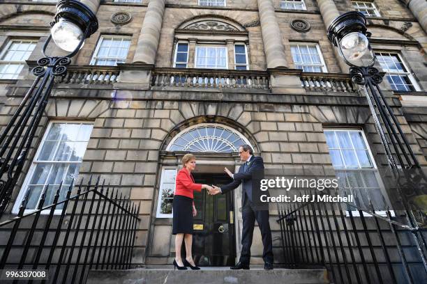 Scotland's First Minister Nicola Sturgeon shakes hands with President of Catalonia Quim Torra, following a meeting at Bute House on July 11, 2018 in...