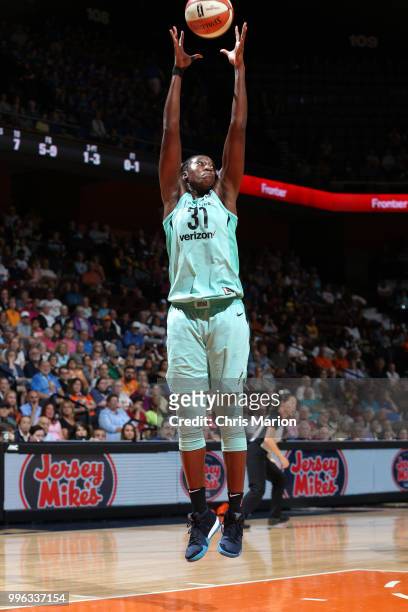 Tina Charles of the New York Liberty grabs the rebound against the Connecticut Sun on July 11, 2018 at the Mohegan Sun Arena in Uncasville,...