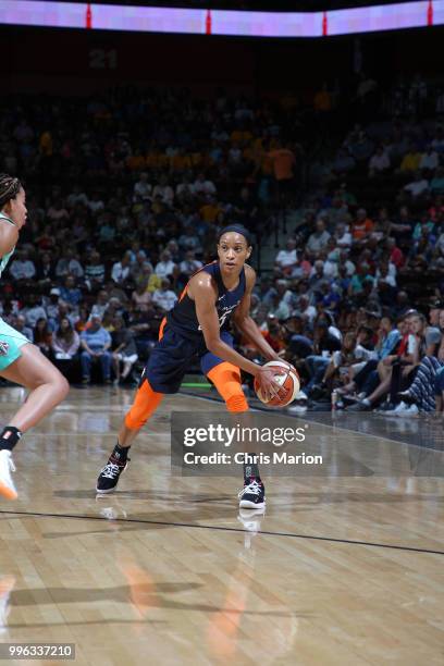 Jasmine Thomas of the Connecticut Sun handles the ball against the New York Liberty on July 11, 2018 at the Mohegan Sun Arena in Uncasville,...