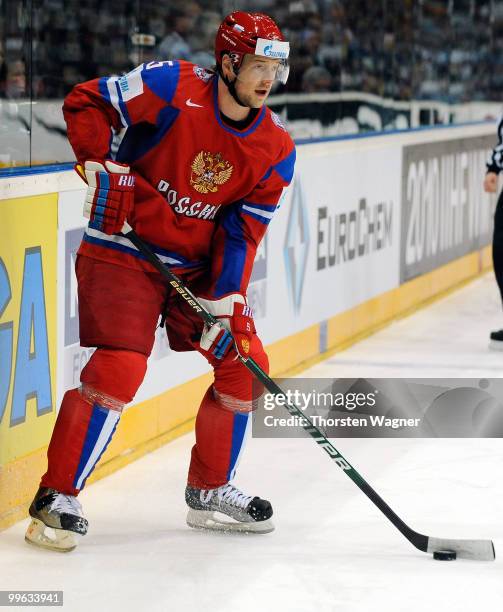 Ilya Nikulin of Russia runs with the puck during the IIHF World Championship qualification round match between Russia and Germany at Lanxess Arena on...