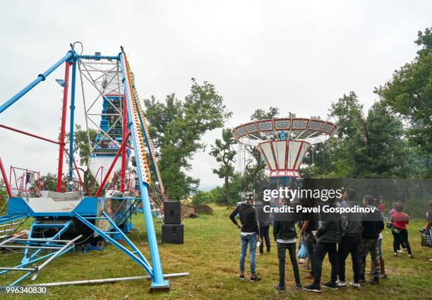 christian and muslim romanies (gypsies), ethnic turks and bulgarians having fun together during the traditional national festivity in the neighborhood of baba kondu in the municipality of targovishte, bulgaria - pavel gospodinov stock pictures, royalty-free photos & images