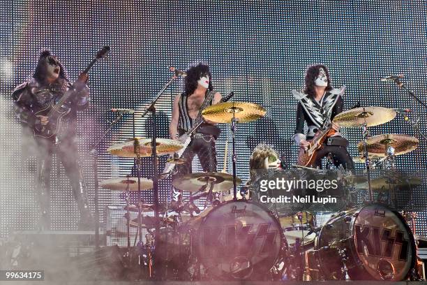 Gene Simmons, Paul Stanley, Eric Singer and Tommy Thayer of KISS perform on stage during their Sonic Boom Over Europe tour at Wembley Arena on May...
