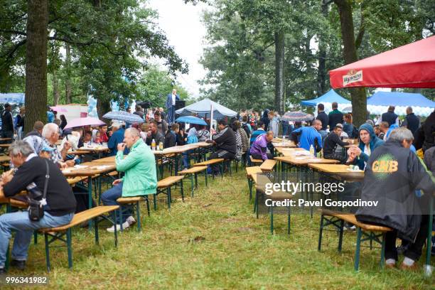 christian and muslim romanies (gypsies), ethnic turks and bulgarians having fun together during the traditional national festivity in the neighborhood of baba kondu in the municipality of targovishte, bulgaria - baba stock pictures, royalty-free photos & images