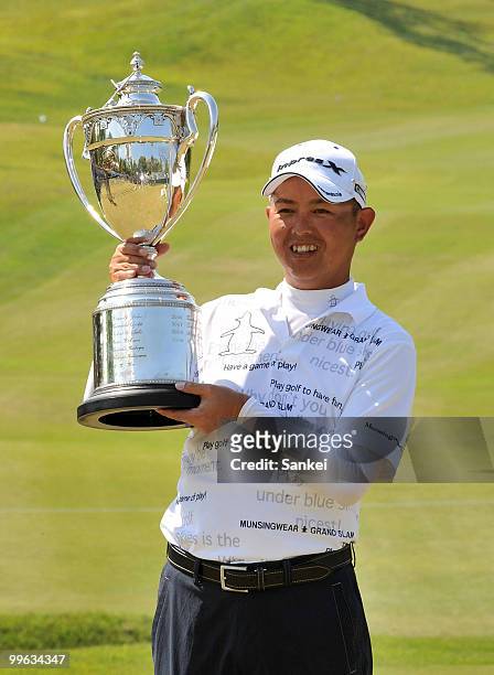 Toru Taniguchi poses with the trophy after winning Japan's PGA Championship Nissin Cup Noodles Cup at Passage Kinkai Island Golf Club on May 16, 2010...