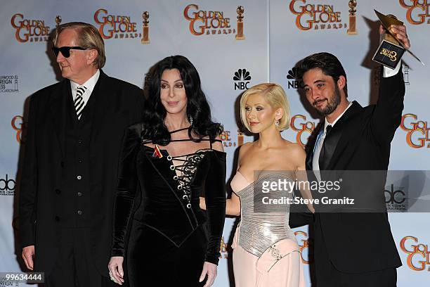 Musician T Bone Burnett, singers Cher and Christina Aguilera, and musician Ryan Bingham pose in the press room at the 67th Annual Golden Globe Awards...