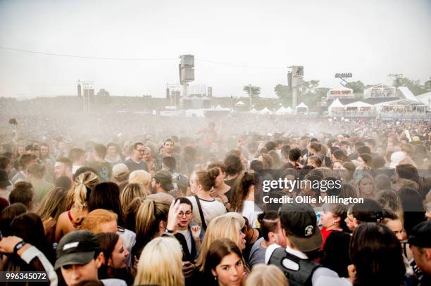 The crowd at the main stage at The Plains of Abraham in The Battlefields Park during day 3 of the 51st Festival d'ete de Quebec on July 7, 2018 in...